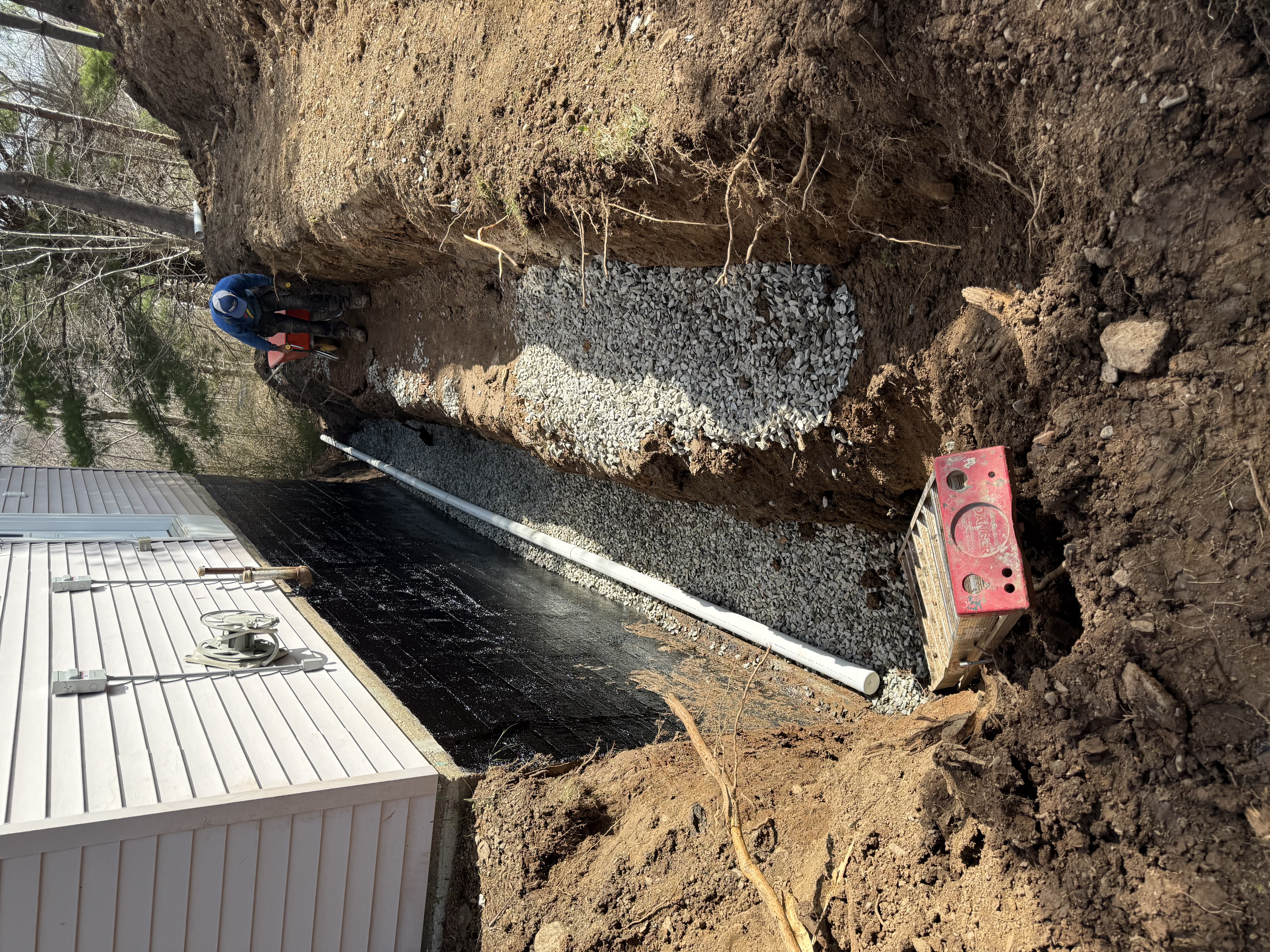 Excavation work for drain tile